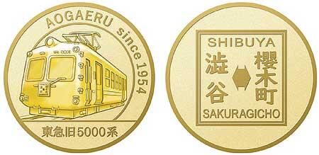 東急百貨店「ハチ公生誕100年記念純金メダル 思い出の渋谷ハチ公広場セット」を発売