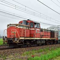 E235系1000番台グリーン車6両が甲種輸送される